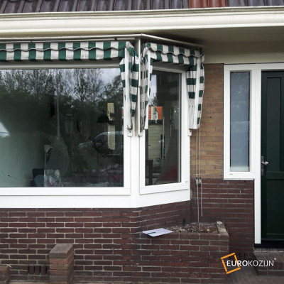Voordeur en erker