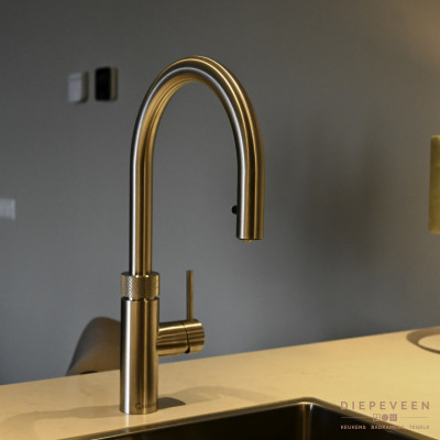 de rvs quooker kraan geeft de keuken een extra luxe uitstraling