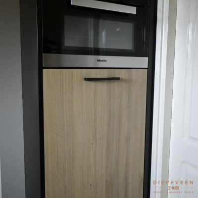Extra opbergruimte in dezelfde stijl als de keuken