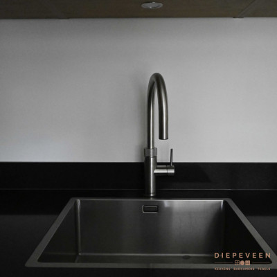 Een rvs quooker kraan