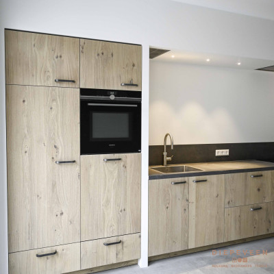 De keuken beschikt over een quooker kraan