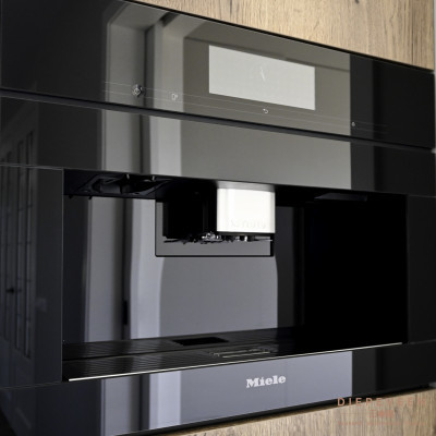 Het gemak van de ingebouwde koffiezetapparaat van Miele