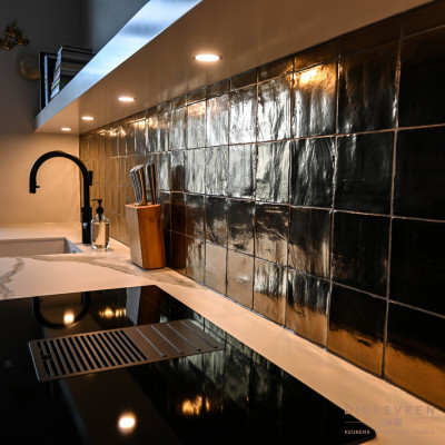 Moderne keuken zwart met goud