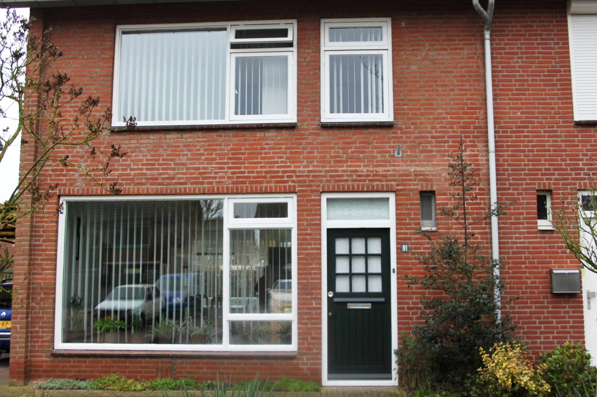 Oude situatie voor gevel huis