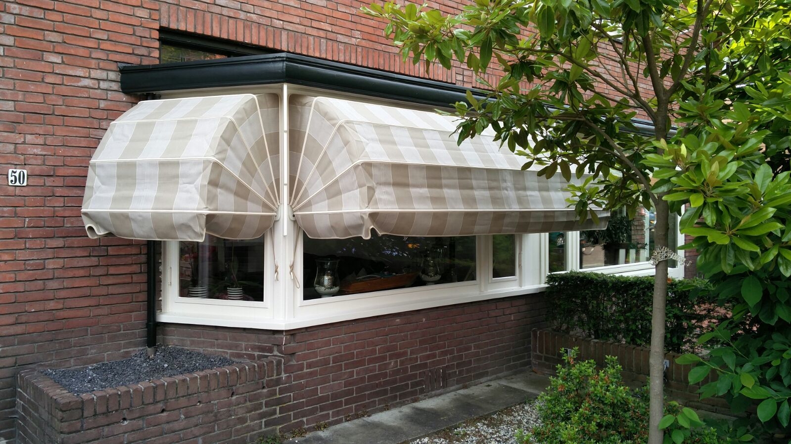 Markiezen erker jaren 30 huis