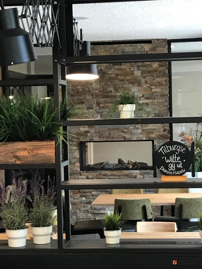Tunnel gashaard in stoer steenconcept bij restaurant De Financiën
