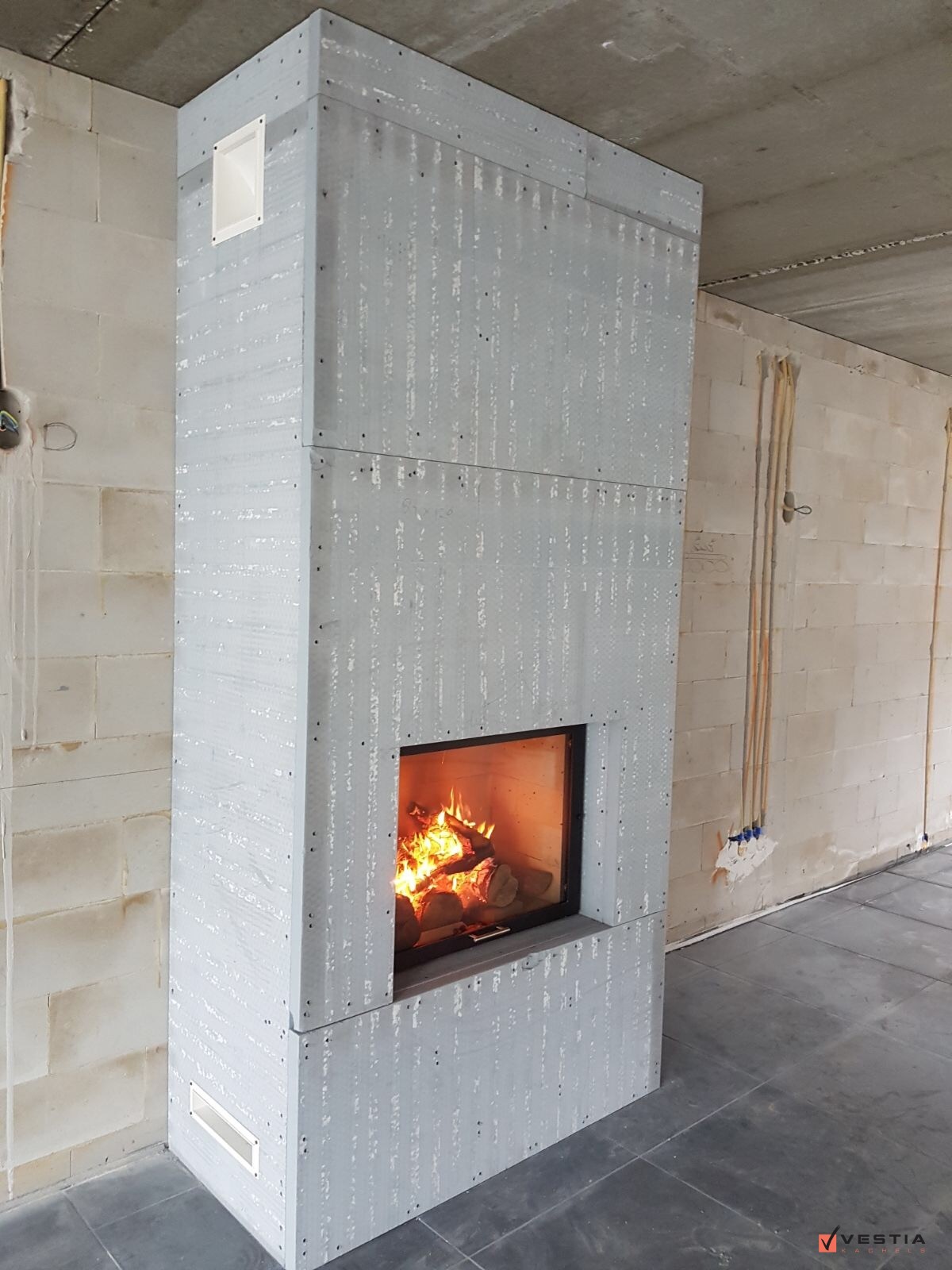 Subtiele liftdeurhaard als heerlijke warmtebron
